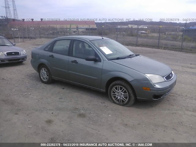 1FAFP34N55W224131 - 2005 FORD FOCUS ZX4 GREEN photo 1