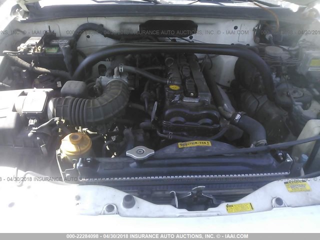 2CNBE13CXY6914907 - 2000 CHEVROLET TRACKER WHITE photo 10