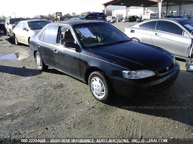 2T1BR12EXWC025564 - 1998 TOYOTA COROLLA VE/CE/LE BLACK photo 1