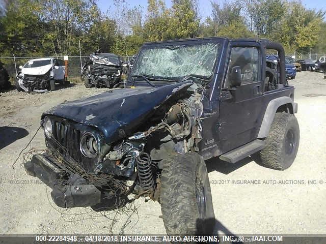 1J4FA49S14P794257 - 2004 JEEP WRANGLER / TJ SPORT BLUE photo 2