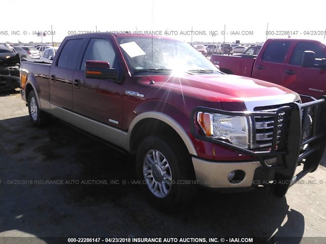 1FTFW1ET3EKE69628 - 2014 FORD F150 SUPERCREW RED photo 1