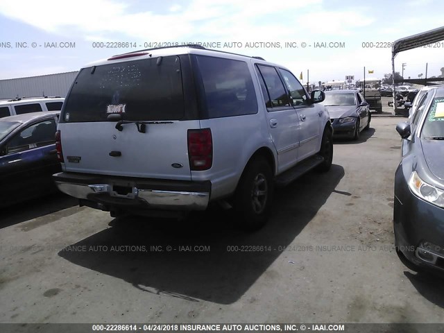1FMPU16L0YLA00726 - 2000 FORD EXPEDITION XLT SILVER photo 4