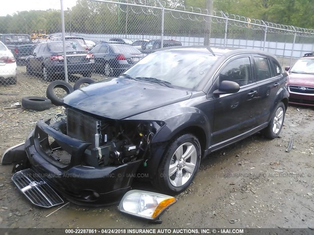 1B3CB3HA5AD648340 - 2010 DODGE CALIBER MAINSTREET BLACK photo 2