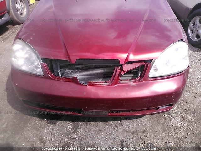 KL5JD52Z94K924955 - 2004 SUZUKI FORENZA S RED photo 6