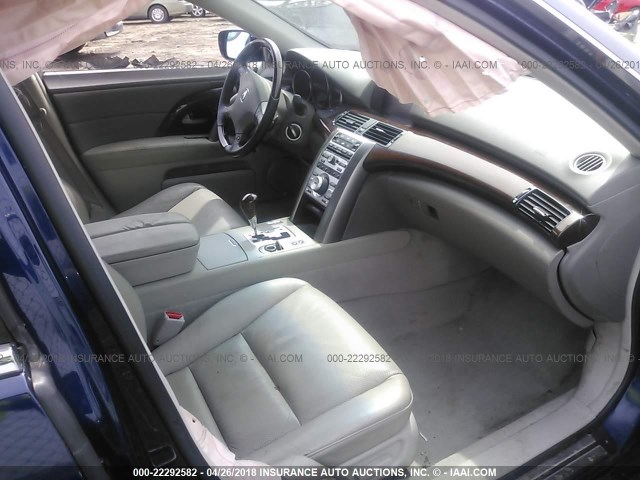 JH4KB16566C009075 - 2006 ACURA RL ლურჯი ფოტო 5