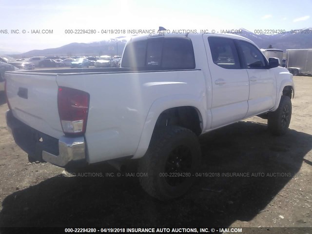 5TFCZ5AN9GX005838 - 2016 TOYOTA TACOMA DBL CAB/SR/SR5/TRD SPT/OR WHITE photo 4