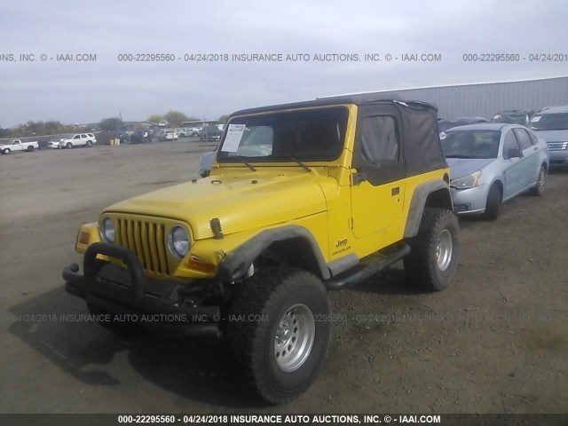 1J4FA39S33P369826 - 2003 JEEP WRANGLER COMMANDO/X YELLOW photo 2