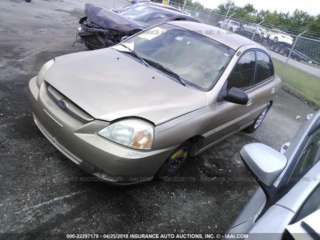 KNADC125546353437 - 2004 KIA RIO GOLD photo 2