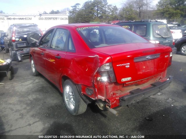 1FAFP34N25W182811 - 2005 FORD FOCUS ZX4 RED photo 6
