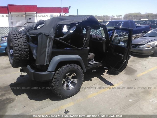 1C4AJWAG2CL228830 - 2012 JEEP WRANGLER SPORT BLACK photo 4