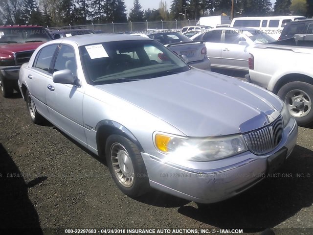 1LNHM81W7XY702428 - 1999 LINCOLN TOWN CAR EXECUTIVE SILVER photo 1