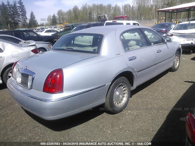 1LNHM81W7XY702428 - 1999 LINCOLN TOWN CAR EXECUTIVE SILVER photo 4