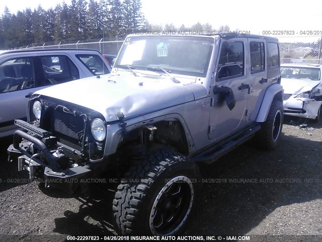 1C4HJWEG0FL681549 - 2015 JEEP WRANGLER UNLIMITE SAHARA SILVER photo 2