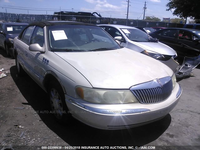 1LNHM97V32Y621908 - 2002 LINCOLN CONTINENTAL  Кремовый фото 1