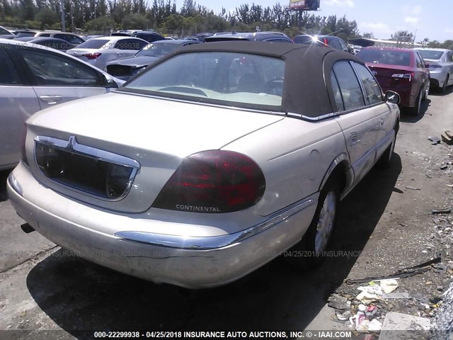 1LNHM97V32Y621908 - 2002 LINCOLN CONTINENTAL  Кремовый фото 4