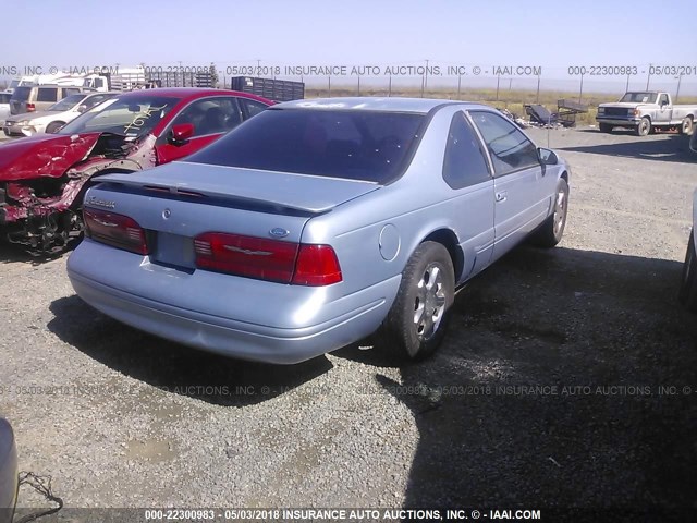 1FALP62W5VH157583 - 1997 FORD THUNDERBIRD LX Light Blue photo 4