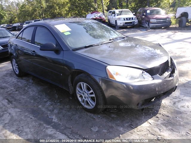 1G2ZG558X64162500 - 2006 PONTIAC G6 SE1 GRAY photo 1