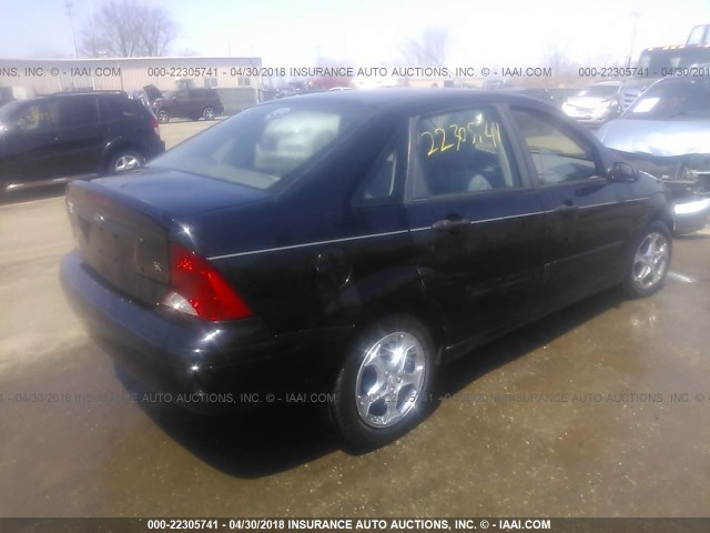 1FAFP34304W166507 - 2004 FORD FOCUS SE COMFORT/SE SPORT BLACK photo 4