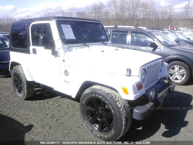 1J4FA59S6YP795674 - 2000 JEEP WRANGLER / TJ SAHARA WHITE photo 1