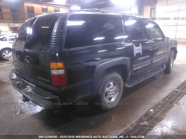 3GNFK16T11G115898 - 2001 CHEVROLET SUBURBAN K1500 BLACK photo 4