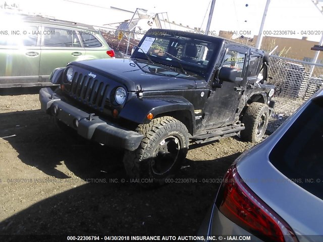 1C4BJWEG7DL586831 - 2013 JEEP WRANGLER UNLIMITE SAHARA BLACK photo 2