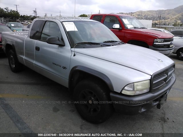 1B7GL12X32S710409 - 2002 DODGE DAKOTA SXT SILVER photo 1