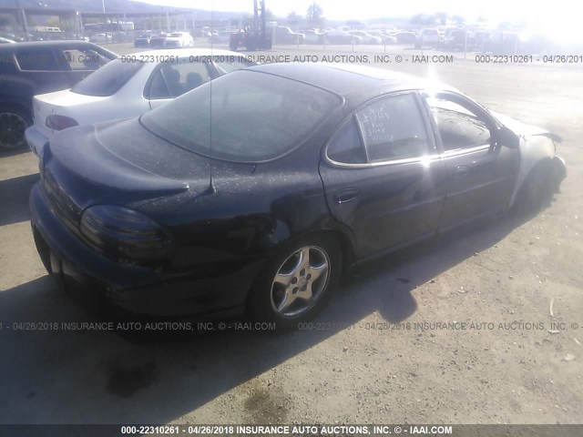 1G2WP5218VF253682 - 1997 PONTIAC GRAND PRIX GTP BLACK photo 4