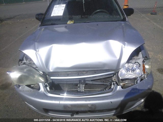 2HGEJ6619YH593078 - 2000 HONDA CIVIC SE SILVER photo 6