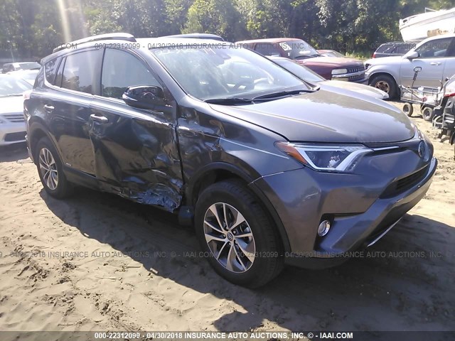 JTMRJREVXHD115514 - 2017 TOYOTA RAV4 HV LE/XLE GRAY photo 1