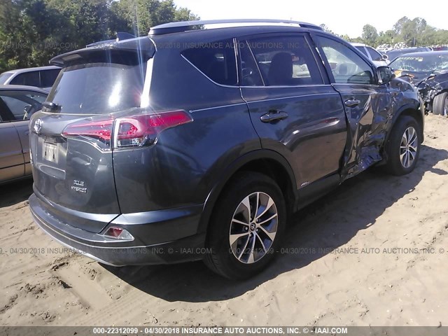 JTMRJREVXHD115514 - 2017 TOYOTA RAV4 HV LE/XLE GRAY photo 4