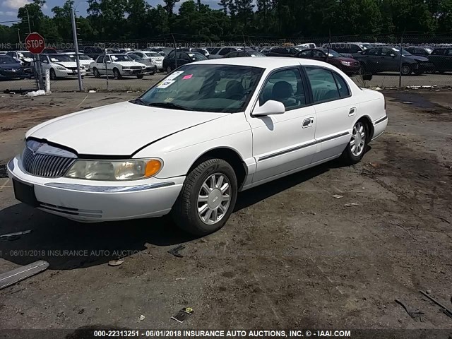 1LNHM97V81Y649167 - 2001 LINCOLN CONTINENTAL  WHITE photo 2