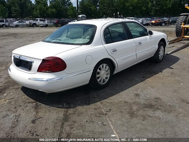 1LNHM97V81Y649167 - 2001 LINCOLN CONTINENTAL  WHITE photo 4