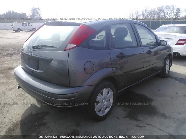 1FAHP37N77W298898 - 2007 FORD FOCUS ZX5/S/SE/SES GRAY photo 4