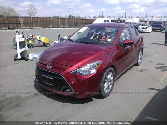 3MYDLBZV7GY108734 - 2016 TOYOTA SCION IA RED photo 2