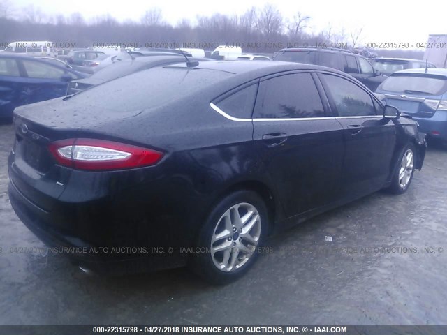 3FA6P0H77GR100930 - 2016 FORD FUSION SE BLACK photo 4