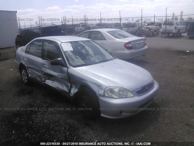 2HGEJ6618XH538491 - 1999 HONDA CIVIC SE SILVER photo 1