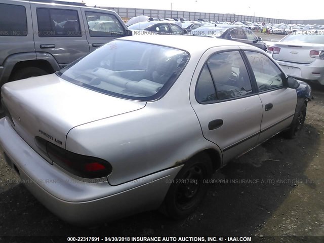 1Y1SK5269SZ092608 - 1995 GEO PRIZM LSI TAN photo 4