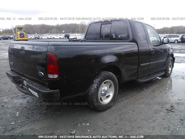 1FTRX17W2XNB42981 - 1999 FORD F150 BLACK photo 4