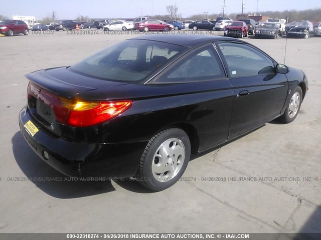 1G8ZY14742Z194828 - 2002 SATURN SC2 BLACK photo 4