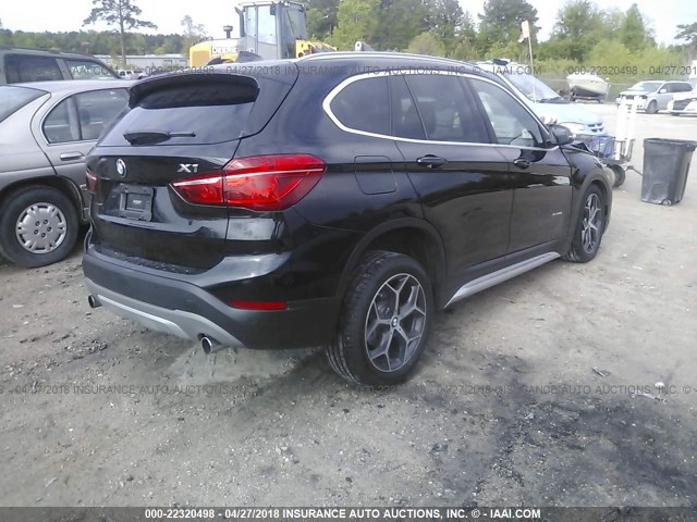 WBXHT3C36GP881986 - 2016 BMW X1 XDRIVE28I BLACK photo 4