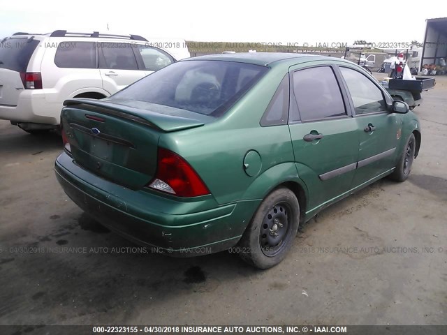 1FAHP33P52W110959 - 2002 FORD FOCUS LX GREEN photo 4