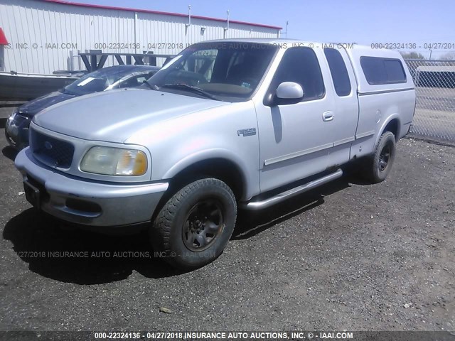 1FTFX28L4VKC65600 - 1997 FORD F250 SILVER photo 2