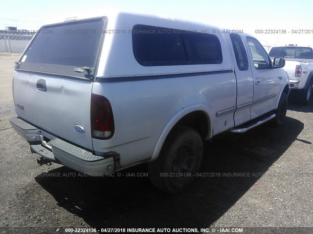 1FTFX28L4VKC65600 - 1997 FORD F250 SILVER photo 4