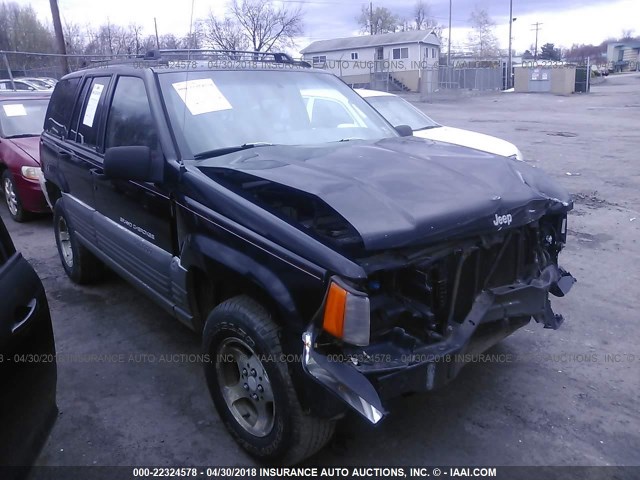 1J4GZ58S1VC689392 - 1997 JEEP GRAND CHEROKEE LAREDO/TSI BLACK photo 1