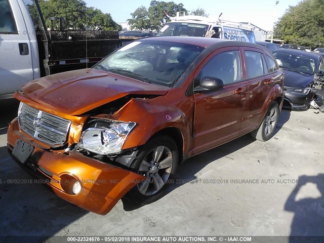 1B3CB3HA0BD247358 - 2011 DODGE CALIBER MAINSTREET ORANGE photo 2