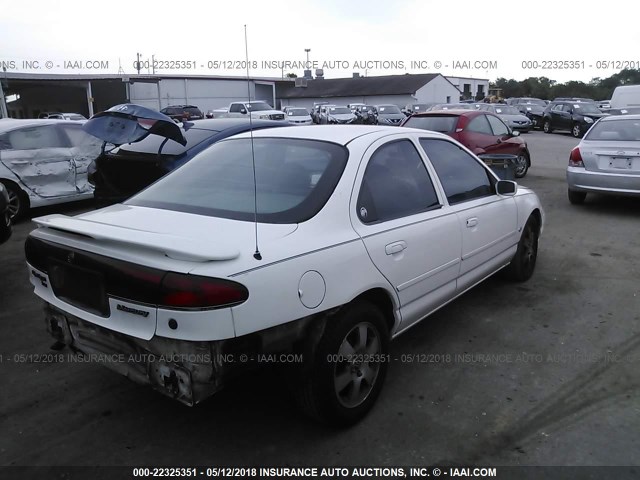 1MEFM66L5XK608516 - 1999 MERCURY MYSTIQUE LS WHITE photo 4