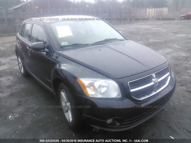 1B3CB3HA1BD108050 - 2011 DODGE CALIBER MAINSTREET BLACK photo 1