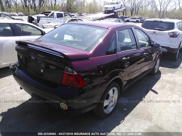 1FAFP34N07W242782 - 2007 FORD FOCUS ZX4/S/SE/SES RED photo 4