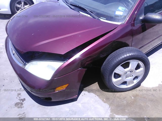 1FAFP34N76W107992 - 2006 FORD FOCUS ZX4 MAROON photo 6