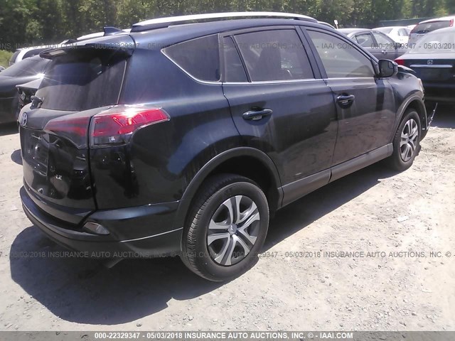 JTMZFREV1HJ147867 - 2017 TOYOTA RAV4 LE GREEN photo 4